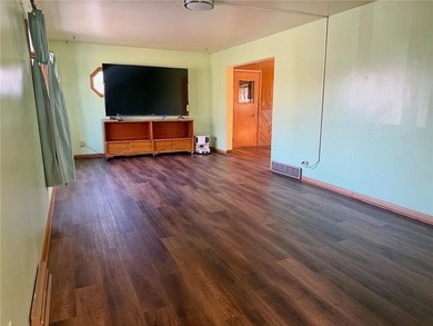 Enjoy golf-course living at its finest. Welcome to this inviting on Worthington Country Club in Minnesota - for sale on GolfHomes.com, golf home, golf lot