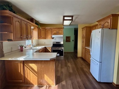 Enjoy golf-course living at its finest. Welcome to this inviting on Worthington Country Club in Minnesota - for sale on GolfHomes.com, golf home, golf lot