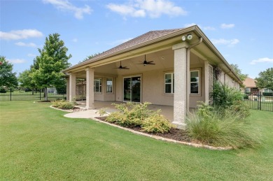 Located in Robson Ranch, an exclusive over-55 community, this on Wildhorse Golf Club of Robson Ranch in Texas - for sale on GolfHomes.com, golf home, golf lot