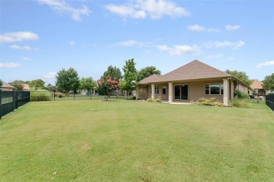 Located in Robson Ranch, an exclusive over-55 community, this on Wildhorse Golf Club of Robson Ranch in Texas - for sale on GolfHomes.com, golf home, golf lot