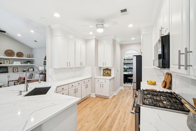 Welcome to this beautifully reimagined Lowcountry home on Charleston National Golf Club in South Carolina - for sale on GolfHomes.com, golf home, golf lot