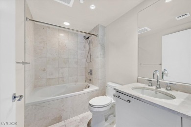 Set on the 10th floor, this two-bedroom plus den, two-bath on  in Nevada - for sale on GolfHomes.com, golf home, golf lot