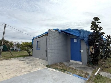 Great opportunity for investors, flippers, or buyers looking to on Port Charlotte Golf Club in Florida - for sale on GolfHomes.com, golf home, golf lot