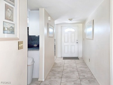 Enjoy this well-maintained, 2nd-floor condo which is being on Kelly Greens Golf and Country Club in Florida - for sale on GolfHomes.com, golf home, golf lot