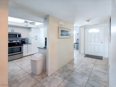 Enjoy this well-maintained, 2nd-floor condo which is being on Kelly Greens Golf and Country Club in Florida - for sale on GolfHomes.com, golf home, golf lot