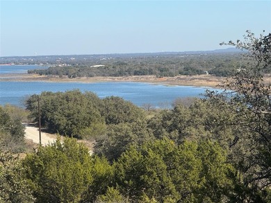 Take in a stunning, elevated view of Lake Brownwood right from on Hideout Golf Club and Resort  in Texas - for sale on GolfHomes.com, golf home, golf lot