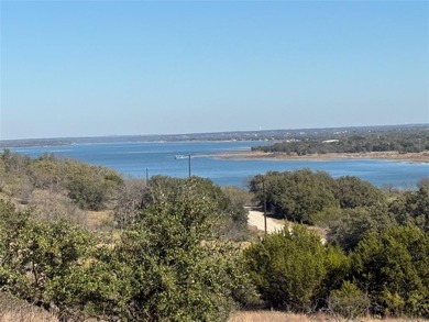 Take in a stunning, elevated view of Lake Brownwood right from on Hideout Golf Club and Resort  in Texas - for sale on GolfHomes.com, golf home, golf lot