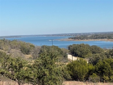 Take in a stunning, elevated view of Lake Brownwood right from on Hideout Golf Club and Resort  in Texas - for sale on GolfHomes.com, golf home, golf lot