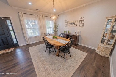 Welcome to this beautifully updated 6-bedroom, 2.5-bath home on Eagle Creek Golf Club and Grill in North Carolina - for sale on GolfHomes.com, golf home, golf lot