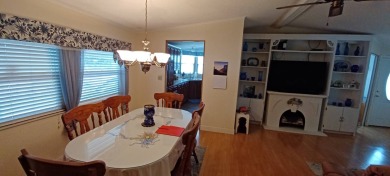 Come settle down and relax in a beautiful manufactured home with on Fairways Country Club in Florida - for sale on GolfHomes.com, golf home, golf lot