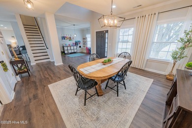 Welcome to this beautifully updated 6-bedroom, 2.5-bath home on Eagle Creek Golf Club and Grill in North Carolina - for sale on GolfHomes.com, golf home, golf lot