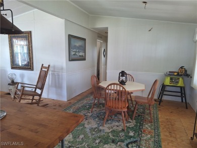 WATERFRONT COMMUNITY - MEMBERSHIP SHARE INCLUDED - AMAZING PRICE on Riverbend Golf and Country Club in Florida - for sale on GolfHomes.com, golf home, golf lot