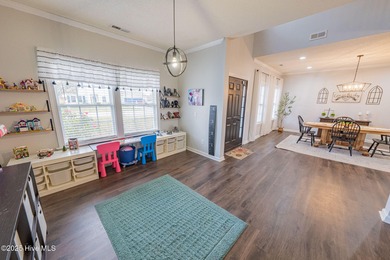 Welcome to this beautifully updated 6-bedroom, 2.5-bath home on Eagle Creek Golf Club and Grill in North Carolina - for sale on GolfHomes.com, golf home, golf lot