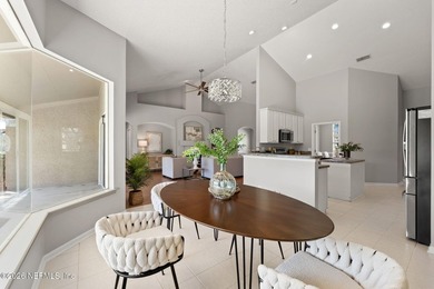 Beautiful 4-bedroom, 3-bath home overlooking the water and the on Eagle Harbor Golf Club in Florida - for sale on GolfHomes.com, golf home, golf lot