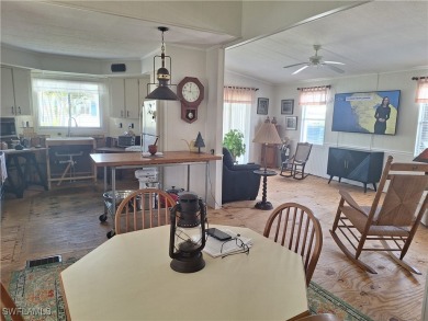 WATERFRONT COMMUNITY - MEMBERSHIP SHARE INCLUDED - AMAZING PRICE on Riverbend Golf and Country Club in Florida - for sale on GolfHomes.com, golf home, golf lot