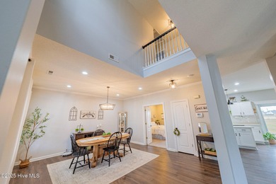 Welcome to this beautifully updated 6-bedroom, 2.5-bath home on Eagle Creek Golf Club and Grill in North Carolina - for sale on GolfHomes.com, golf home, golf lot