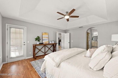 Beautiful 4-bedroom, 3-bath home overlooking the water and the on Eagle Harbor Golf Club in Florida - for sale on GolfHomes.com, golf home, golf lot