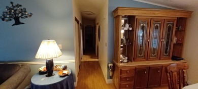 Come settle down and relax in a beautiful manufactured home with on Fairways Country Club in Florida - for sale on GolfHomes.com, golf home, golf lot