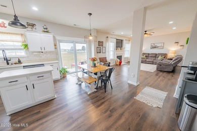 Welcome to this beautifully updated 6-bedroom, 2.5-bath home on Eagle Creek Golf Club and Grill in North Carolina - for sale on GolfHomes.com, golf home, golf lot