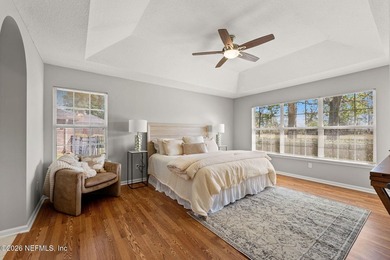 Beautiful 4-bedroom, 3-bath home overlooking the water and the on Eagle Harbor Golf Club in Florida - for sale on GolfHomes.com, golf home, golf lot