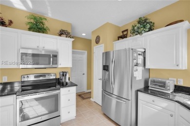 Beautifully maintained villa offering serene golf course views on Hidden Cypress Golf Club in South Carolina - for sale on GolfHomes.com, golf home, golf lot