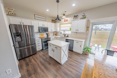 Welcome to this beautifully updated 6-bedroom, 2.5-bath home on Eagle Creek Golf Club and Grill in North Carolina - for sale on GolfHomes.com, golf home, golf lot