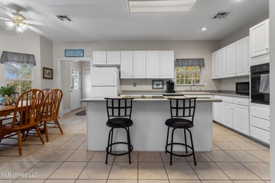 After 30 years of single family ownership, this 2,486 SF home is on Pass Christian Isles Golf Club in Mississippi - for sale on GolfHomes.com, golf home, golf lot