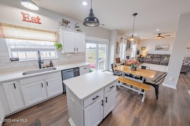 Welcome to this beautifully updated 6-bedroom, 2.5-bath home on Eagle Creek Golf Club and Grill in North Carolina - for sale on GolfHomes.com, golf home, golf lot