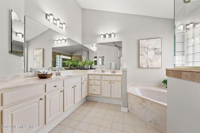 Beautiful 4-bedroom, 3-bath home overlooking the water and the on Eagle Harbor Golf Club in Florida - for sale on GolfHomes.com, golf home, golf lot