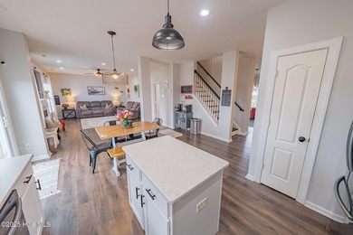 Welcome to this beautifully updated 6-bedroom, 2.5-bath home on Eagle Creek Golf Club and Grill in North Carolina - for sale on GolfHomes.com, golf home, golf lot