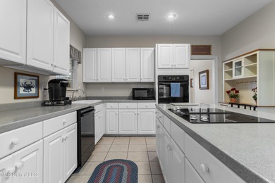 After 30 years of single family ownership, this 2,486 SF home is on Pass Christian Isles Golf Club in Mississippi - for sale on GolfHomes.com, golf home, golf lot