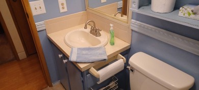 Come settle down and relax in a beautiful manufactured home with on Fairways Country Club in Florida - for sale on GolfHomes.com, golf home, golf lot