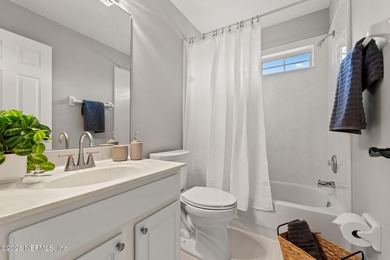 Beautiful 4-bedroom, 3-bath home overlooking the water and the on Eagle Harbor Golf Club in Florida - for sale on GolfHomes.com, golf home, golf lot