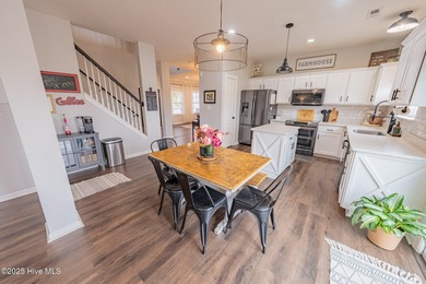 Welcome to this beautifully updated 6-bedroom, 2.5-bath home on Eagle Creek Golf Club and Grill in North Carolina - for sale on GolfHomes.com, golf home, golf lot