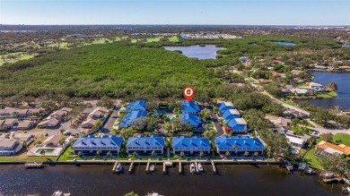 Discover this delightful 2 bedroom + den, 2.5 bath, 1 car on Mangrove Bay Golf Course in Florida - for sale on GolfHomes.com, golf home, golf lot