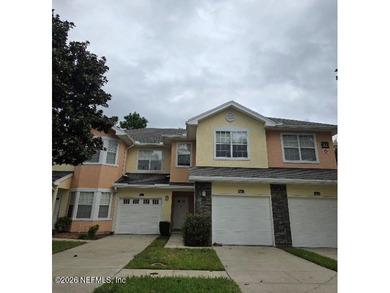 This 3-bedroom, 2.5-bath home newly painted, offers a spacious on Amelia National Golf and Country Club in Florida - for sale on GolfHomes.com, golf home, golf lot