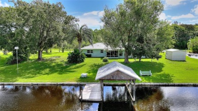 Don't Miss This Canal-Front Charmer!  Located in the desirable on Indian Lake Estates Golf and Country Club in Florida - for sale on GolfHomes.com, golf home, golf lot