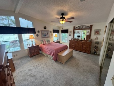 Beautiful stucco home on the exterior perimeter.  Updated on Del Tura Golf and Country Club in Florida - for sale on GolfHomes.com, golf home, golf lot