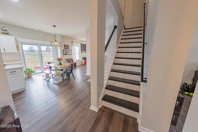 Welcome to this beautifully updated 6-bedroom, 2.5-bath home on Eagle Creek Golf Club and Grill in North Carolina - for sale on GolfHomes.com, golf home, golf lot