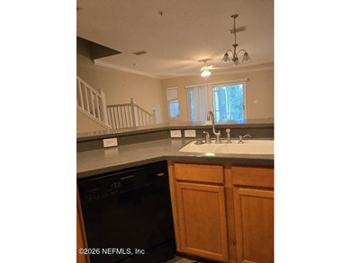 This 3-bedroom, 2.5-bath home newly painted, offers a spacious on Amelia National Golf and Country Club in Florida - for sale on GolfHomes.com, golf home, golf lot