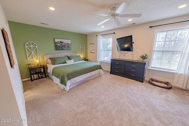 Welcome to this beautifully updated 6-bedroom, 2.5-bath home on Eagle Creek Golf Club and Grill in North Carolina - for sale on GolfHomes.com, golf home, golf lot