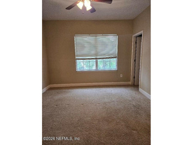 This 3-bedroom, 2.5-bath home newly painted, offers a spacious on Amelia National Golf and Country Club in Florida - for sale on GolfHomes.com, golf home, golf lot