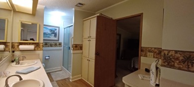 Come settle down and relax in a beautiful manufactured home with on Fairways Country Club in Florida - for sale on GolfHomes.com, golf home, golf lot