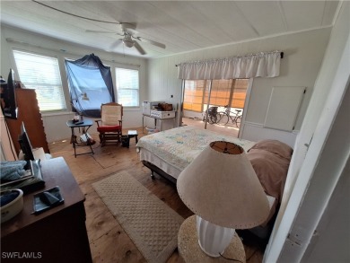 WATERFRONT COMMUNITY - MEMBERSHIP SHARE INCLUDED - AMAZING PRICE on Riverbend Golf and Country Club in Florida - for sale on GolfHomes.com, golf home, golf lot