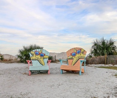 This beautiful 5 bedrooms and 4.5 baths raised beach house is in on Prestwick Country Club in South Carolina - for sale on GolfHomes.com, golf home, golf lot