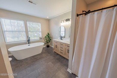 Welcome to this beautifully updated 6-bedroom, 2.5-bath home on Eagle Creek Golf Club and Grill in North Carolina - for sale on GolfHomes.com, golf home, golf lot