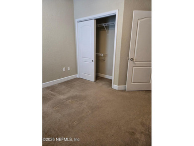 This 3-bedroom, 2.5-bath home newly painted, offers a spacious on Amelia National Golf and Country Club in Florida - for sale on GolfHomes.com, golf home, golf lot