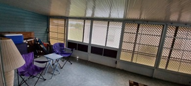 Come settle down and relax in a beautiful manufactured home with on Fairways Country Club in Florida - for sale on GolfHomes.com, golf home, golf lot