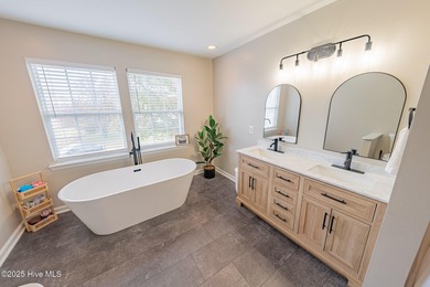 Welcome to this beautifully updated 6-bedroom, 2.5-bath home on Eagle Creek Golf Club and Grill in North Carolina - for sale on GolfHomes.com, golf home, golf lot