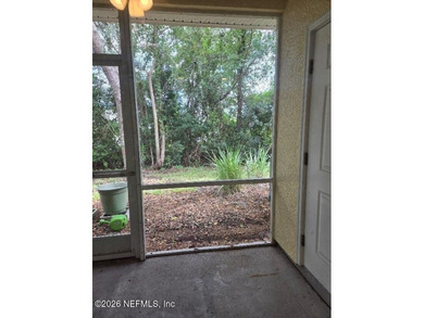 This 3-bedroom, 2.5-bath home newly painted, offers a spacious on Amelia National Golf and Country Club in Florida - for sale on GolfHomes.com, golf home, golf lot